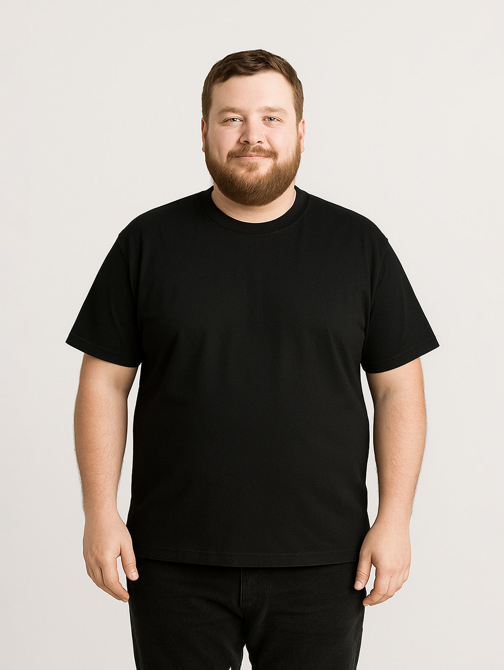 Plus-size male model in black premium t-shirt – Zarvion inclusive fit for men