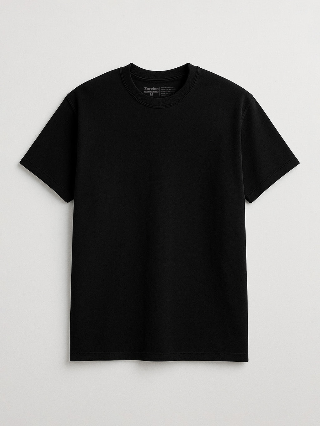 Flat lay front view of Zarvion vintage tee in Black – heavyweight cotton shirt on light gray background