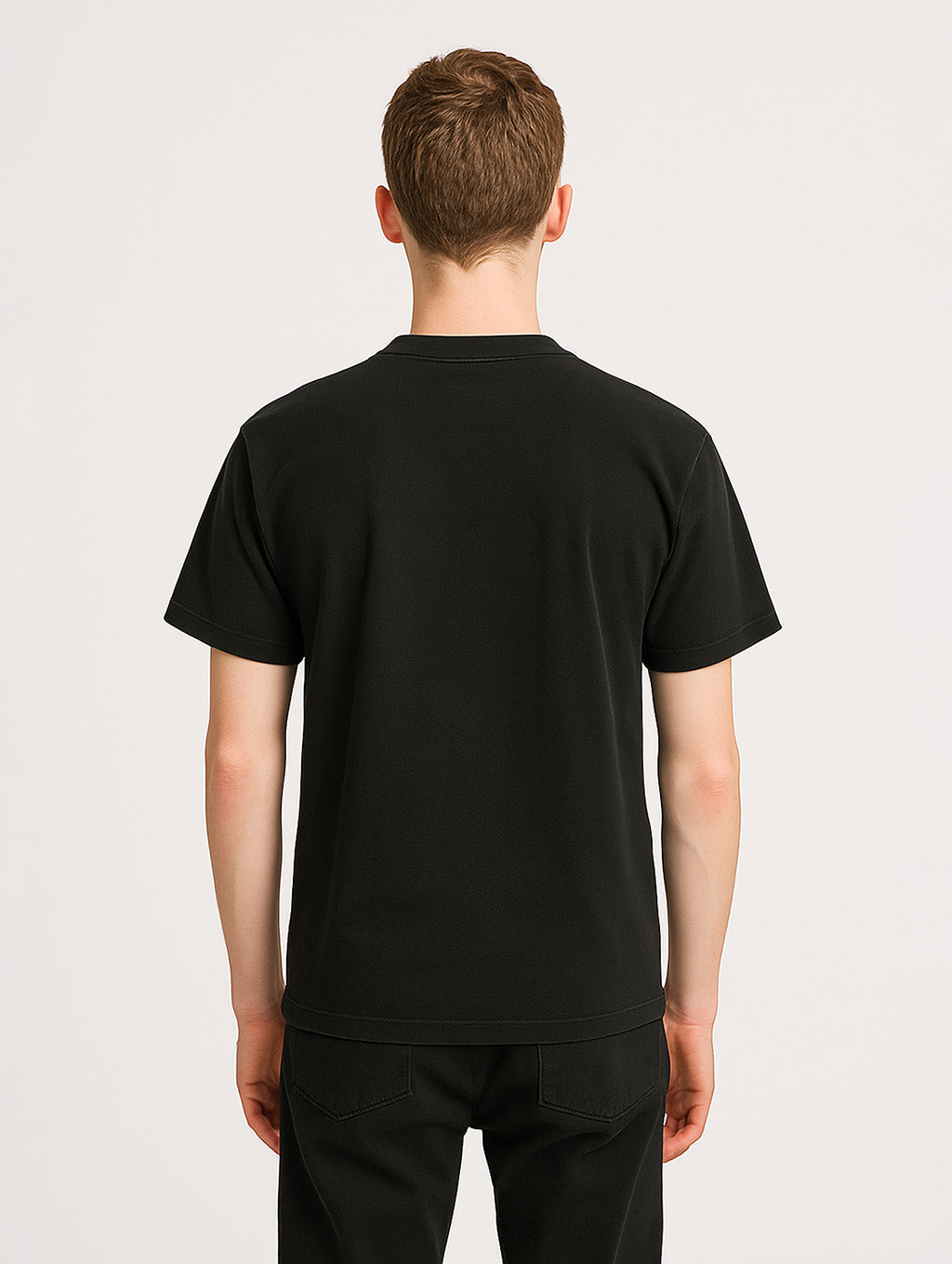 Back view of slim male model wearing Black Zarvion vintage tee – relaxed fit streetwear