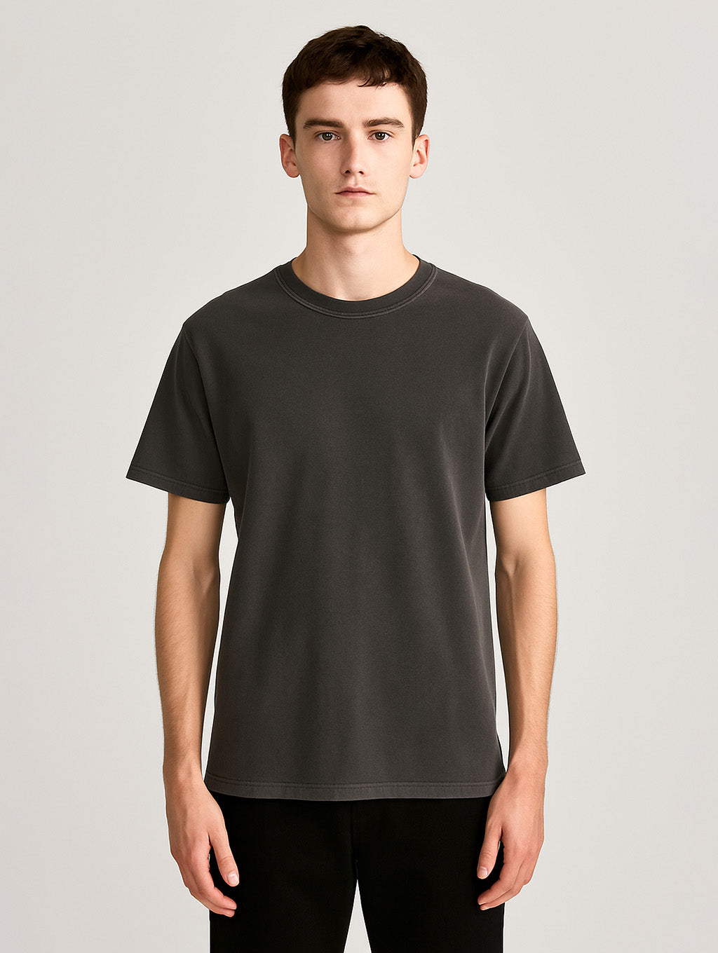 Front view of slim male model in Charcoal Zarvion vintage tee – classic fit streetwear style