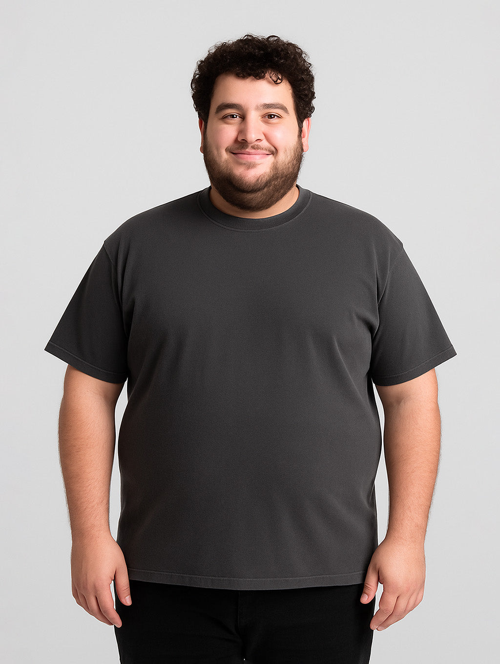 Plus-size male model in Zarvion Charcoal t-shirt – inclusive relaxed fit for all body types