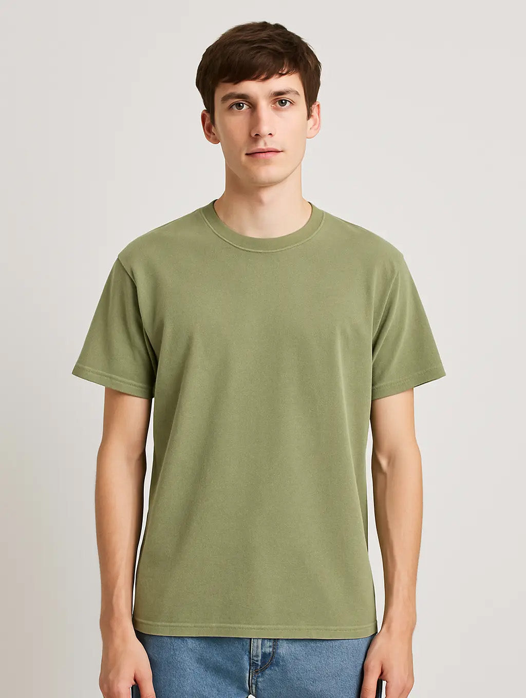 Front view of slim model in Zarvion Dusty Olive vintage t-shirt – heavyweight cotton, relaxed fit design