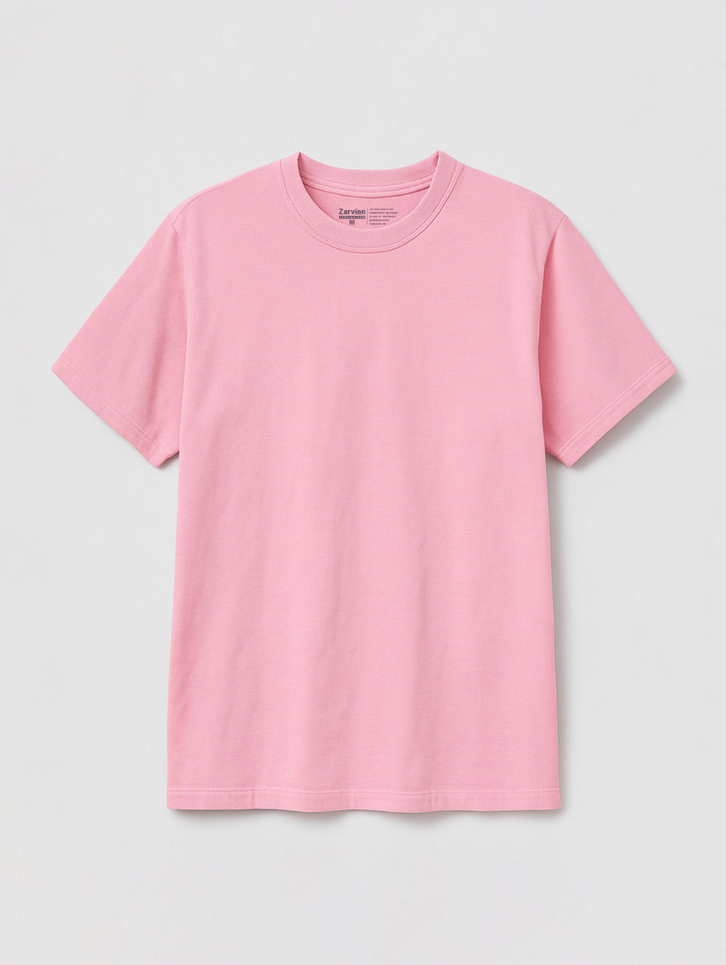 Flat lay front view of Blush Blossom Pink vintage tee by Zarvion – relaxed fit short-sleeve t-shirt on neutral background