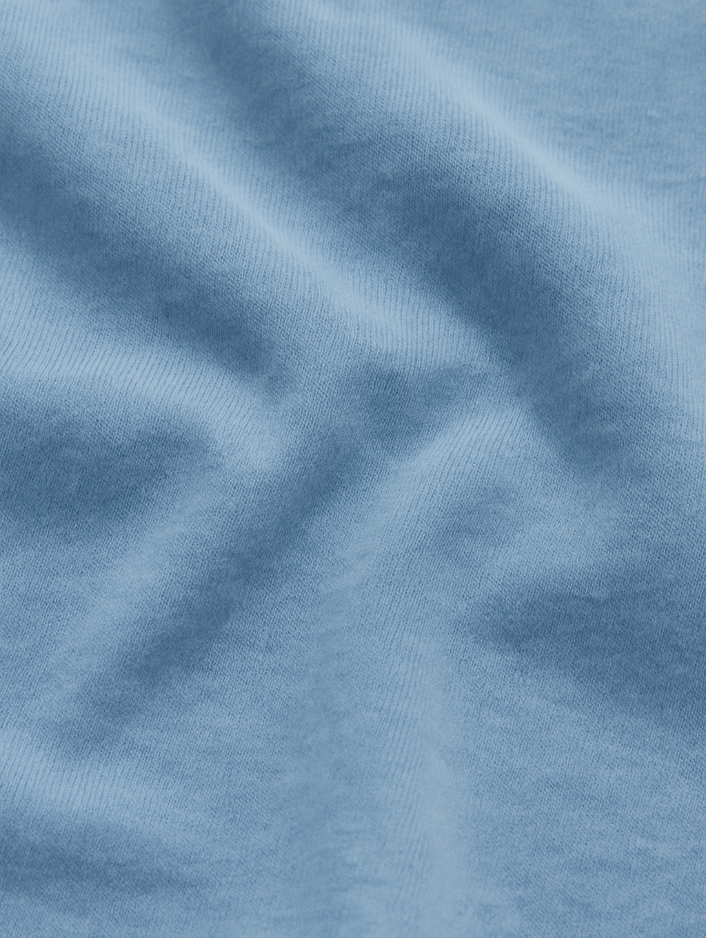 Heavyweight cotton texture of Worn Denim Blue Zarvion tee – soft, breathable garment-dyed fabric detail