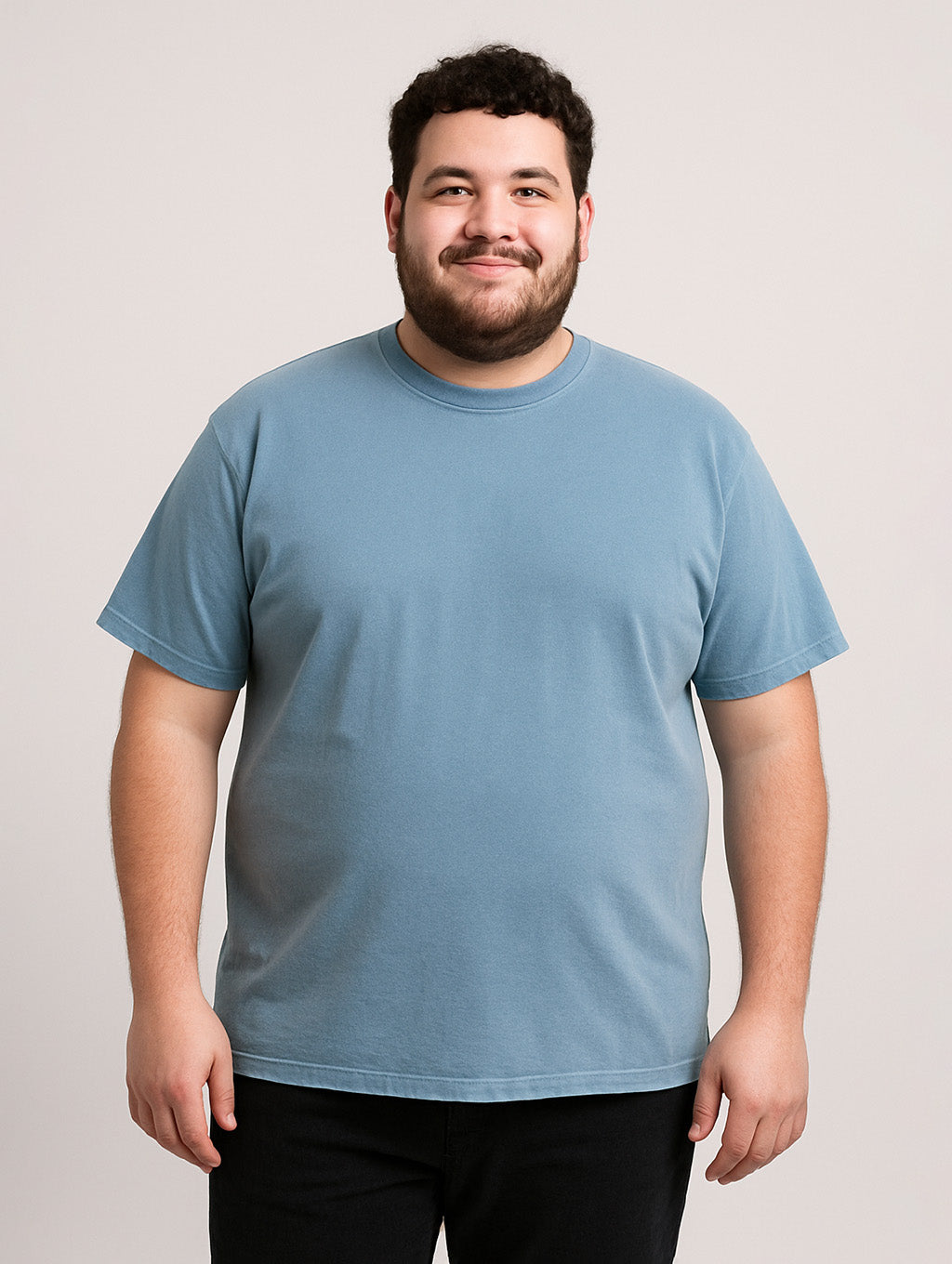 Plus-size male model in Zarvion Worn Denim Blue vintage tee – inclusive fit heavyweight cotton T-shirt