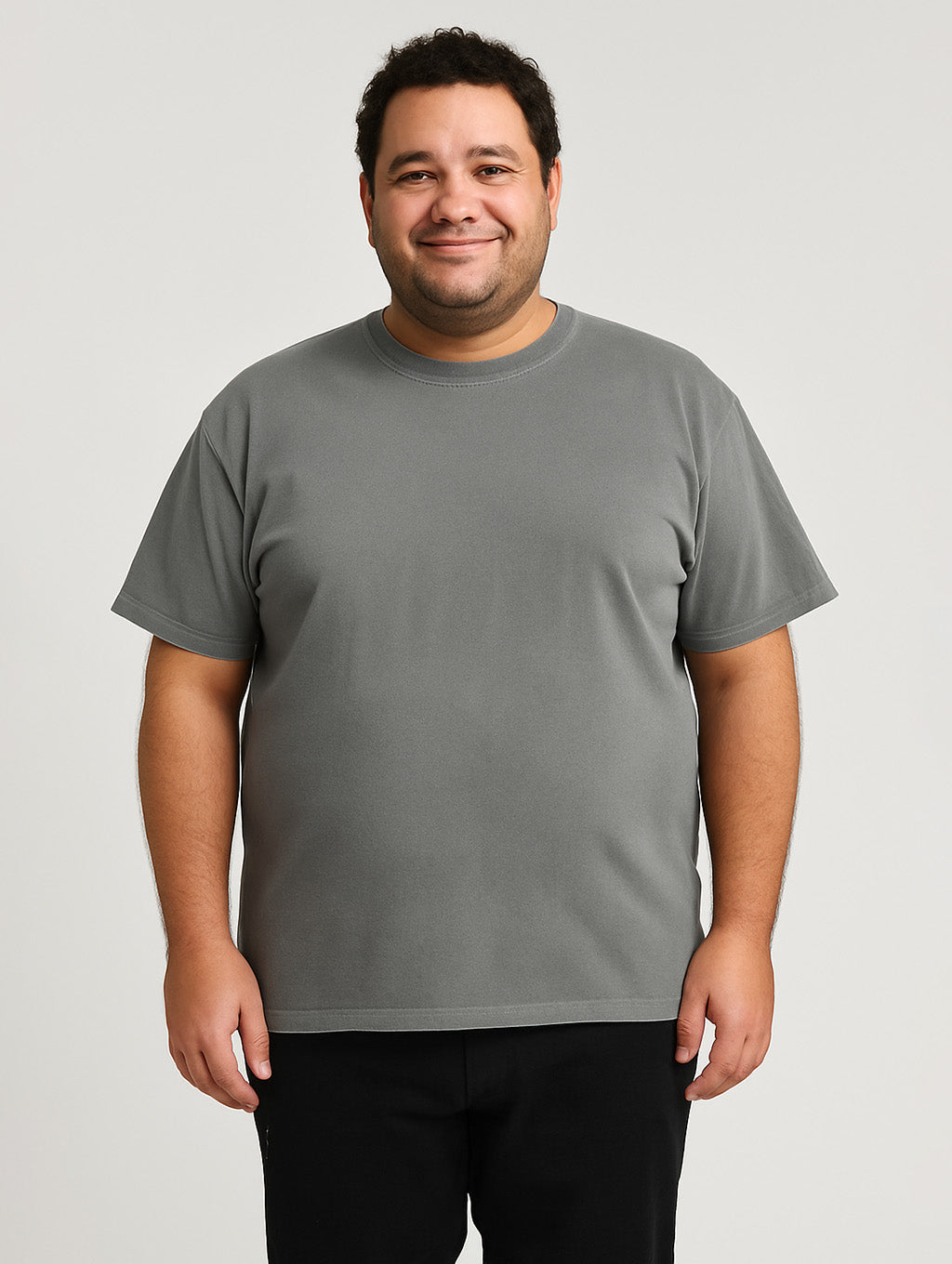 Plus-size model in Zarvion Ash Grey vintage t-shirt – inclusive relaxed fit for every body type