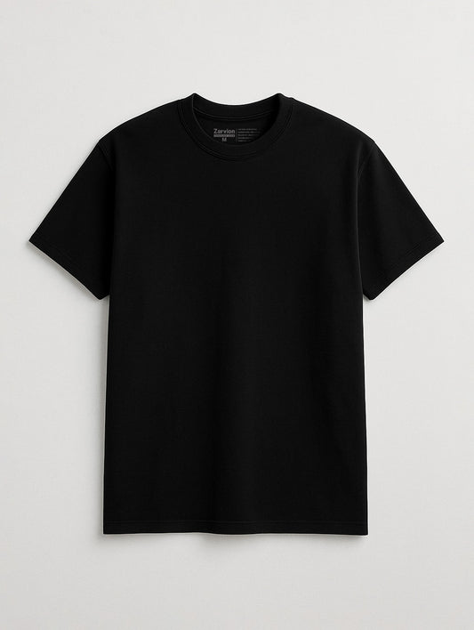 Flat lay front view of Zarvion vintage tee in Black – heavyweight cotton shirt on light gray background