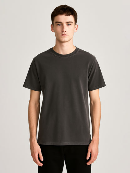 Front view of slim male model in Charcoal Zarvion vintage tee – classic fit streetwear style