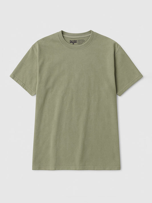 Flat lay front view of Zarvion vintage t-shirt in Dusty Olive – relaxed fit cotton tee on neutral background