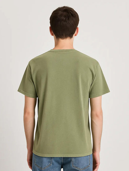 Back view of male model wearing Dusty Olive Zarvion vintage tee – classic fit streetwear style